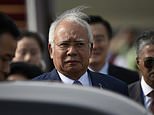 Malaysian PM seeks to win over voters in pre-poll budget