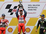 Dovizioso wins Malaysia MotoGP to extend title fight