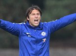 Chelsea boss Antonio Conte barks orders during training