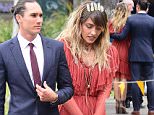 Paris Jackson gets cosy with mystery man at Melbourne Cup