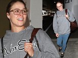 Ronda Rousey goes make-up free for a flight to LA