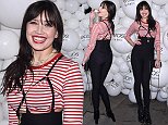 Daisy Lowe showcases her assets in quirky harness jumpsuit