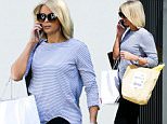 Sylvia Jeffreys wears billowing top while running errands