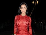 Demi Rose shows off her curves in eye-popping red mini
