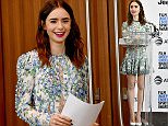 Lily Collins shows off her slender legs in a floral frock