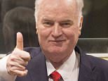 Ratko Mladic gives a thumbs up in UN war crimes tribunal