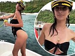 Emily Ratajkowski flaunts her famous assets in a monokini