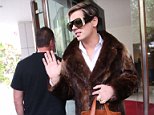 Milo Yiannopoulos pictured wearing thick fur coat in Perth