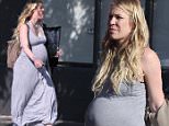 Pregnant Natasha Bedingfield shows off her baby bump in LA
