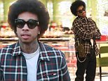 Tyga debuts new afro shopping in Beverly Hills