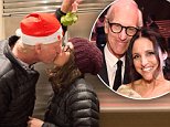 Julia Louis-Dreyfus shares holiday photo kissing husband