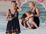 Holly Willoughby at beach with son Chester in Barbados