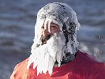 Michigan surfer's beard FREEZES over in Lake Superior