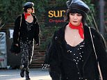 Vanessa Hudgens dons star dress and leather hat in LA
