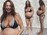 Camilla Franks, 41, cradles her huge baby bump