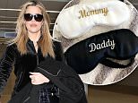 Pregnant Khloe Kardashian hides baby bump at airport