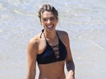 Ashley Hart shows off her toned curves in a skimpy bikini