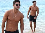 Mike Thalassitis shows off his abs on Cape Verde trip