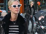 Nicky Hilton sports black leather coat with daughter in NY