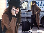 Michelle Keegan looks chic as she arrives at LA airport