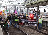 Protesters shut London King's Cross and Manchester Piccadilly