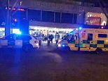 Man is stabbed to death at an east London shopping centre