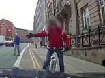 Furious cyclist in raging stand-off with BMW driver in Liverpool