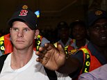 Cricket scandal: Steve Smith is paraded through Johannesburg Airport like a 'drug mule'