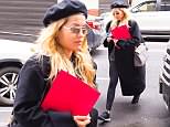Rita Ora nails casual chic in a black trench coat and beret as she takes a stroll through New York