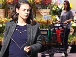 Mila Kunis goes make-up free and rocks two completely different casual outfits to run errands in LA