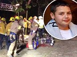 Boy, 13, falls 25 feet into Los Angeles sewage pipes sparking a 100-person manhunt