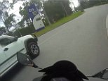 Brisbane motorcyclist almost crashes after ute intentionally swerves into it
