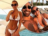 Kate Wright flaunts her busty assets and washboard abs in Dubai with beau Rio Ferdinand