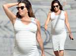 Eva Longoria dresses up baby bump in clingy grey dress ahead of appearance on Jimmy Kimmel