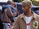 Jaden Smith takes time out of a PDA with girlfriend Odessa Adlon to check his phone