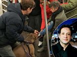 Pit bull owner in viral video of woman being attacked by dog on NY subway is arrested on stalking