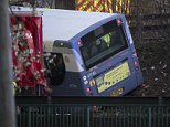 Two people are seriously injured as a single-decker bus careers off the road in Glasgow