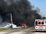Military plane crashes near airport in Georgia