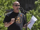 Father of Parkland teen killed in shooting is heckled as he protests outside NRA convention