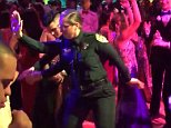 Cops bust a move at high school prom after escorting special needs students to the event in Florida