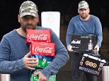 George Calombaris lugs heavy case of beer amid bitter feud with his neighbour