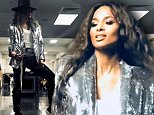 Ciara channels Michael Jackson in a black hat and sequined silver coat for Seattle benefit concert