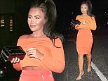 Lauren Goodger flashes a glimpse of her taut midriff in form-fitting dress as she dines in London