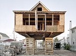 Photos capture house raising in Jersey Shore after Hurricane Sandy