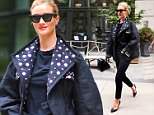 Rosie Huntington-Whiteley struts around NYC with studded jacket and $2k Balenciaga triangle bag