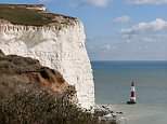 Three bodies are found at the foot of Beachy Head as police hunt for fourth missing person