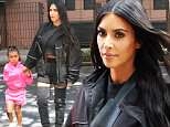 Kim Kardashian takes North candy shopping in NYC