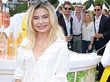 Georgia 'Toff' Toffolo nails summer chic in a white ruffled blouse as she reunites with MIC pals