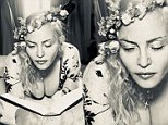 Madonna, 59, flaunts her ample cleavage while reading a Leonardo da Vinci book in bed