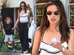 Alessandra Ambrosio flashes a bit of midriff in chic white top as she takes son Noah shopping in LA